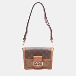Louis Vuitton: Коричневая сумка 