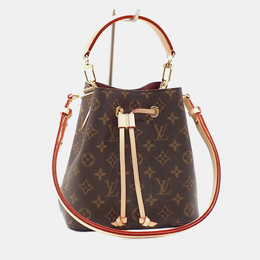 Louis Vuitton: Коричневая сумка 