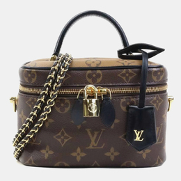 Louis Vuitton: Коричневая сумка 
