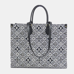 Louis Vuitton: Синяя сумка-шоппер 