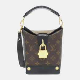 Louis Vuitton: Коричневая сумка 