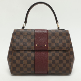 Louis Vuitton: Коричневая сумка 
