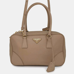 Prada: Бежевая сумка 