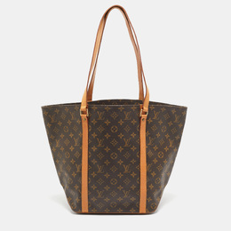 Louis Vuitton: Коричневая сумка-шоппер 