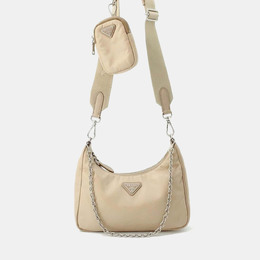Prada: Бежевая сумка 