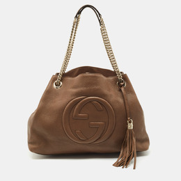 Gucci: Коричневая сумка  Soho