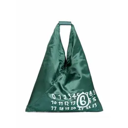 Maison Margiela: Зелёная сумка 