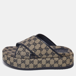 Gucci: Бежевые сандалии  GG