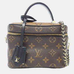 Louis Vuitton: Коричневая сумка 