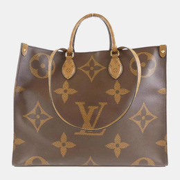 Louis Vuitton: Коричневая сумка-шоппер 