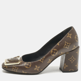 Louis Vuitton: Коричневые туфли 