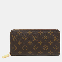 Louis Vuitton: Коричневый кошелёк  Zippy