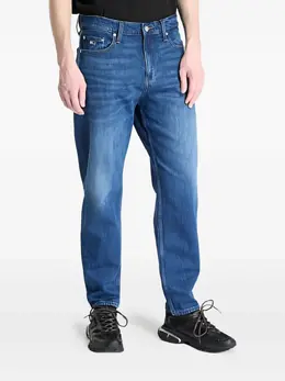 Tommy Jeans: Голубые джинсы 