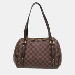 Louis Vuitton: Коричневая сумка 