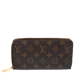 Louis Vuitton: Коричневый кошелёк  Zippy