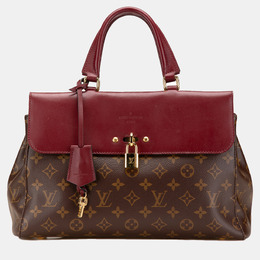 Louis Vuitton: Коричневая сумка 