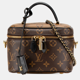 Louis Vuitton: Коричневая сумка 