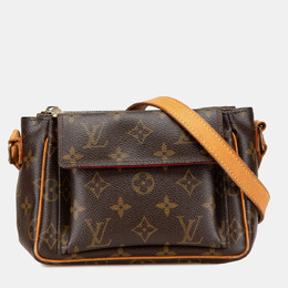 Louis Vuitton: Коричневая сумка 