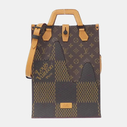 Louis Vuitton: Коричневая сумка-шоппер 