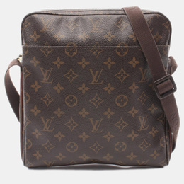 Louis Vuitton: Коричневая сумка 