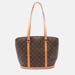 Louis Vuitton: Коричневая сумка 