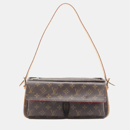 Louis Vuitton: Коричневая сумка 