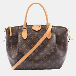 Louis Vuitton: Коричневая сумка 