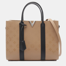 Louis Vuitton: Бежевая сумка-шоппер 