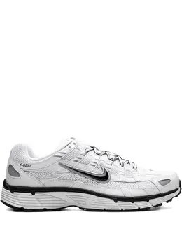 Nike: Серебристые кроссовки 