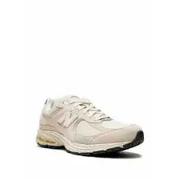 New Balance: Коричневые кроссовки  2002R