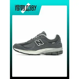 New Balance: Серые кроссовки 