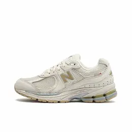 New Balance: Бежевые кроссовки  2002R