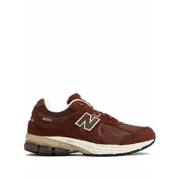 New Balance: Коричневые кроссовки 
