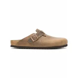 Birkenstock: Коричневые сабо 