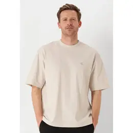 Calvin Klein Jeans: Бежевая футболка 