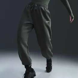 NIKE: Спортивные брюки 