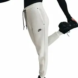 NIKE: Спортивные брюки  Tech Fleece