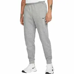 NIKE: Спортивные брюки  Therma