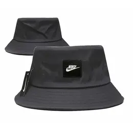NIKE: Серая шапка 