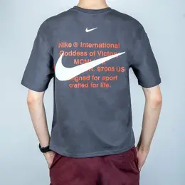 NIKE: Спортивная футболка 