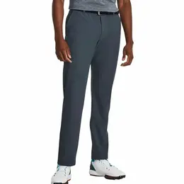 Under Armour: Серые брюки 