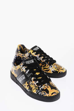 Versace: Кожаные джинсы 