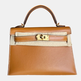 Hermes: Коричневая сумка  Kelly