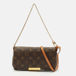 Louis Vuitton: Коричневая сумка 