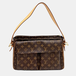 Louis Vuitton: Коричневая сумка 