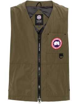 Canada Goose: Зелёная куртка 