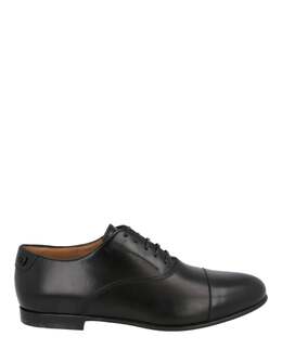 Salvatore Ferragamo: Чёрные туфли 