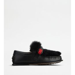 Tod's: Чёрные лоферы 