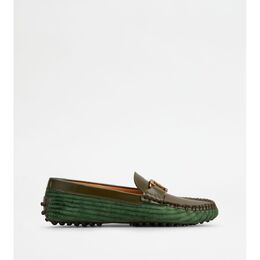 Tod's: Зелёные туфли  Timeless Gommino