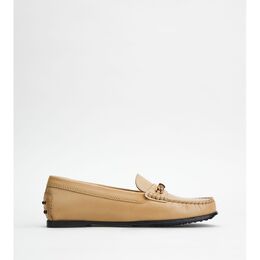 Tod's: Бежевые мокасины 